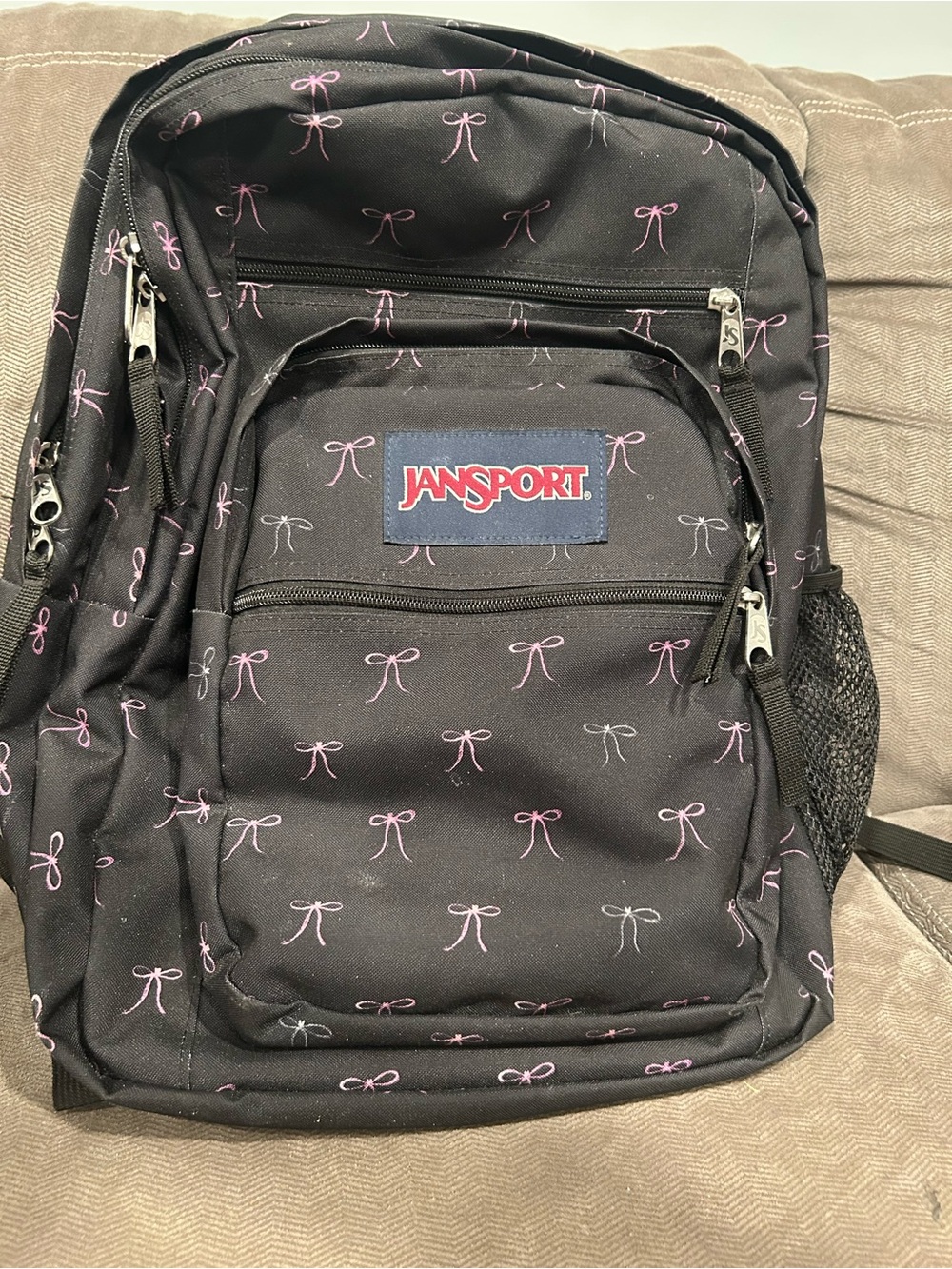 Jansport Black Backpack with Pink Bow Pattern